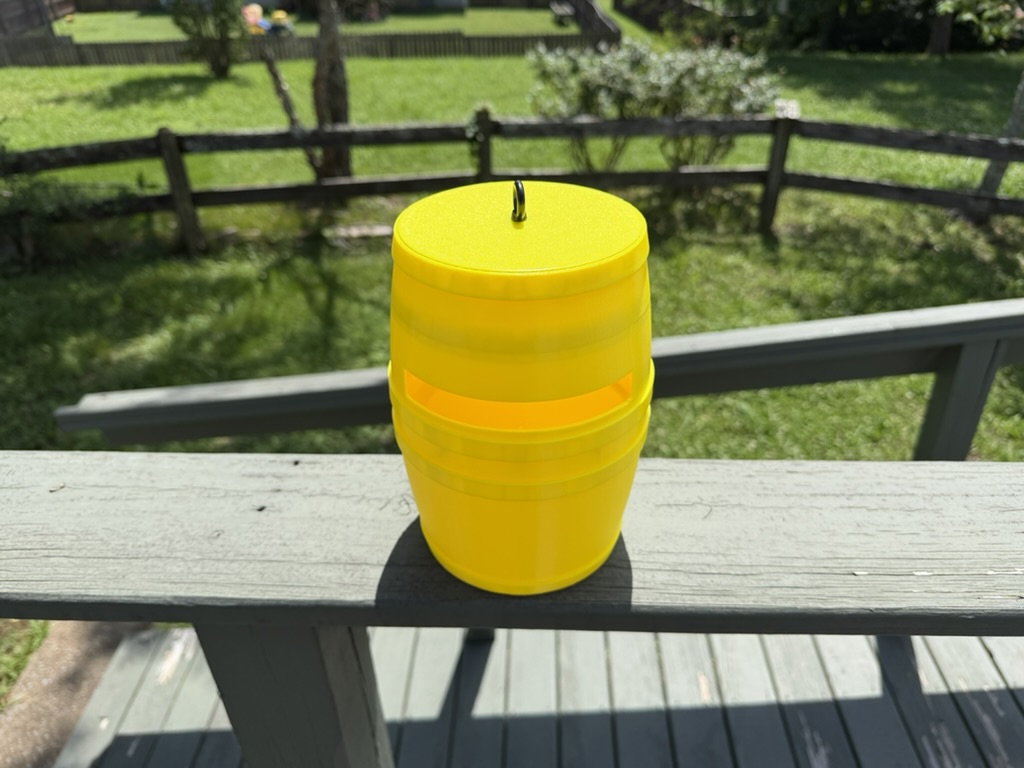 Yellow barrel closed on deck rail